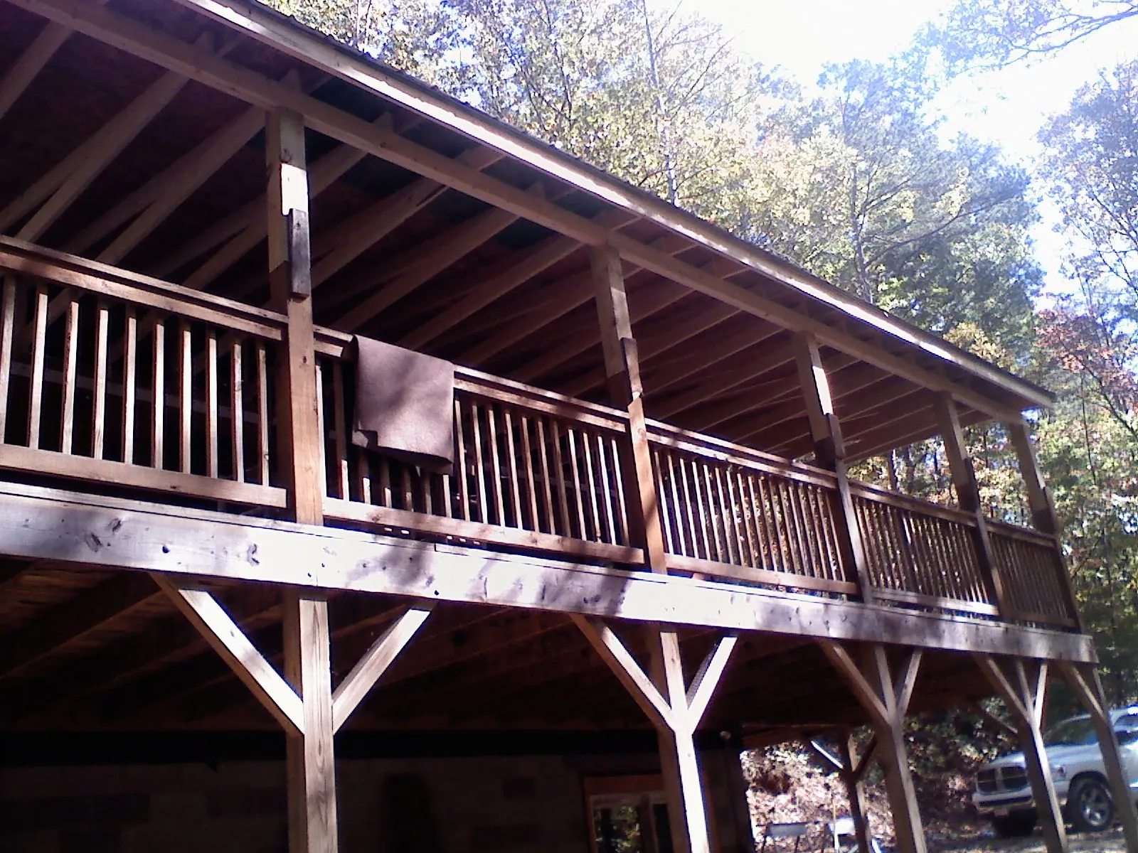 Timber framing under a new elevated porch and deck — Roof Leak Repair in De Borgia by Roofing Brothers